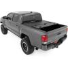 imageRough Country Hard TriFold Flip Up Truck Bed Tonneau Cover for Toyota Tacama 20052015  Fits 5 Bed AllWeather Flush Aluminum Panels