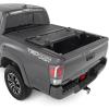 imageRough Country Hard TriFold Tonneau Cover for Toyota Tacoma 20162023  LowProfile Aluminum Truck Bed Cover Fits 5 Bed 605quot6 Bed