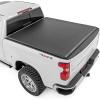 imageRough Country Hard TriFold Flip Up Truck Bed Tonneau Cover for Chevy Silverado ampamp GMC Sierra 1500 20192025  Flush Aluminum Bed Cover Fits 67 794quot Bed510 Short Bed