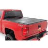 imageRough Country Hard TriFold Flip Up Truck Bed Tonneau Cover for Chevy Silverado and GMC Sierra 15002500HD3500HD 20142019  Fits 59 Bed with Rail Caps