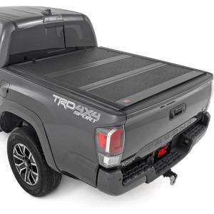 imageRough Country Hard TriFold Tonneau Cover for Toyota Tacoma 20162023  LowProfile Aluminum Truck Bed Cover Fits 5 Bed 605quot6 Bed