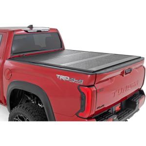 imageRough Country Hard TriFold Tonneau Cover for Toyota Tundra 20222025  LowProfile Aluminum Truck Bed Cover Fits 57 Bed wCargo MGMT