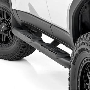 imageRough Country Oval Nerf Steps for Toyota Land Cruiser 20242025  OEM Style Rails with Builtin Side Steps