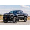 imageRough Country 4quot Lift Kit with M1 StrutsM1 Monotube Shocks for Chevy Colorado ampamp GMC Canyon 20232026