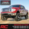 imageRough Country 4quot Loaded N3 Lifted Struts for 20092013 Ford F150 4WD  501054 Silver