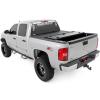 imageRough Country Hard TriFold Flip Up Truck Bed Tonneau Cover for Chevy Silverado and GMC Sierra 1500 20072013  Fits 59 693quot Bed with Rail Caps