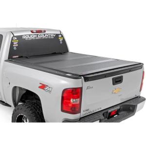 imageRough Country Hard TriFold Flip Up Truck Bed Tonneau Cover for Chevy Silverado and GMC Sierra 1500 20072013  Fits 59 693quot Bed with Rail Caps