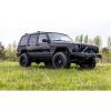 imageRough Country 3quot Lift Kit wM1 Shocks for 19842001 Jeep Cherokee XJ  63040
