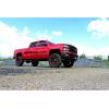 imageRough Country 7 Lift Kit with M1 Loaded StrutsM1 Rear Shocks for Chevy Silverado amp GMC Sierra 1500 20142016